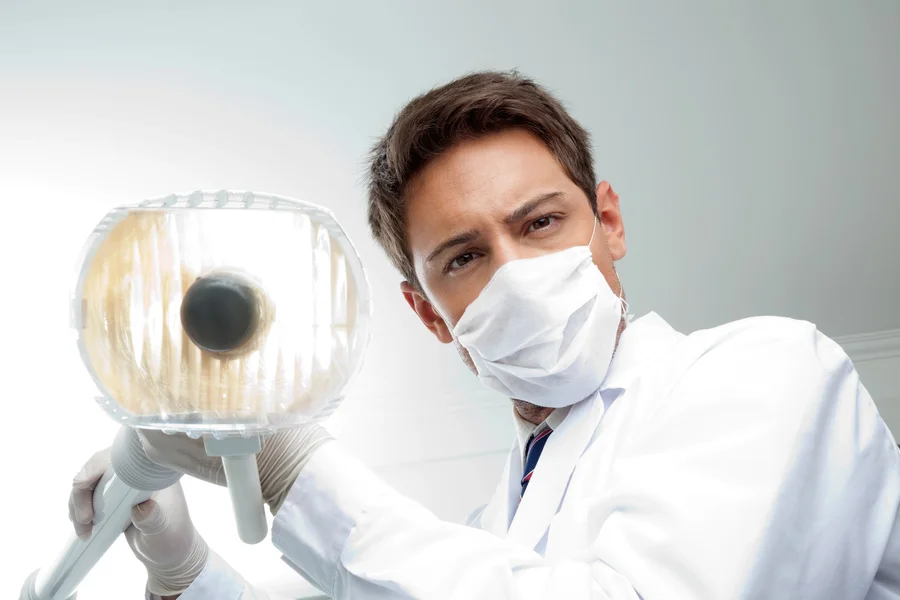 Dentist near Westover Arlington VA performing an oral examination
