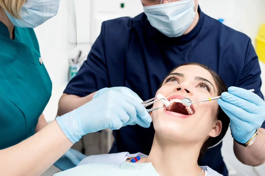 Dentist near Westover Arlington VA performing a routine dental exam